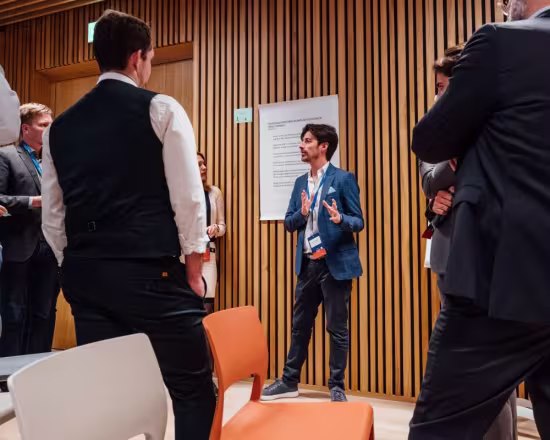 startup founder speaking to small audience