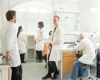 The Rivus team in the lab, working and talking